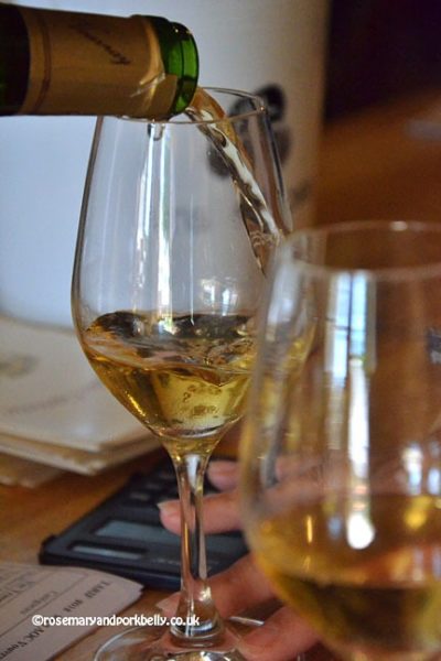 Pouring Vouvray wine
