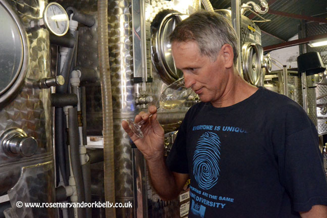 Kevin Sutherland sampling the wine Bluebell vineyard Sussex