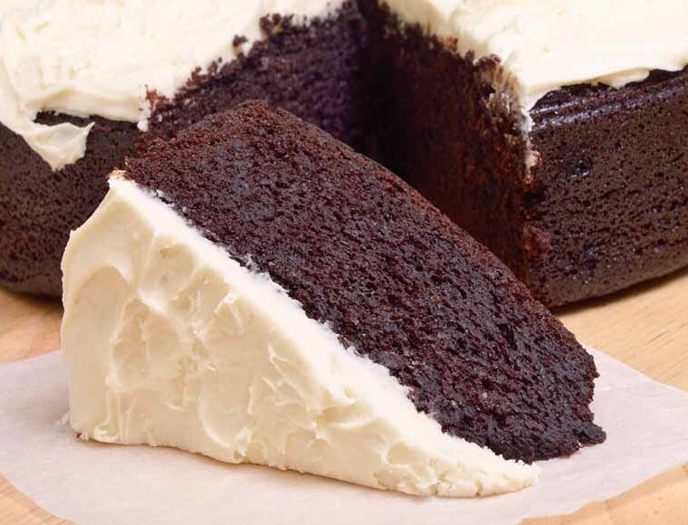 Guinness and Blackcurrant chocolate cake with white non-dairy chocolate icing