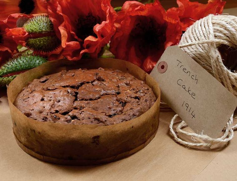 Trench cake with artificial poppies and 1914 date label