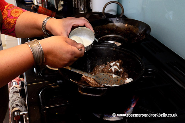 Adding yoghurt to the Qorma