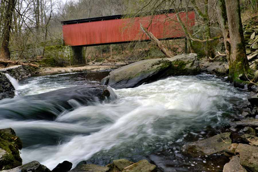 The Thomas Mill Covered Bridge. Originally built in 1737, this is the only remaining covered bridge in the Wissahickon Valley Park on Forbidden Drive, Philadelphia