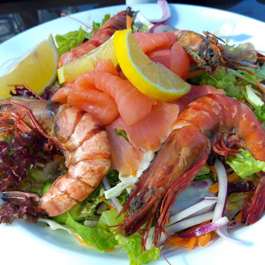 Seafood salad with prawn, salmon, mussels, at Aphrodite's Rock Brewery, Paphos Cyprus