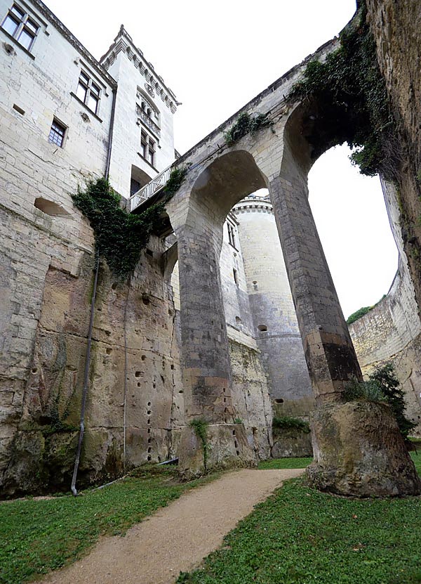 Looking up to the entrance from the deep dry moat at Château de Brézé, Loire, France