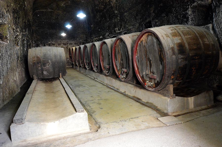 Old wooden wine casks at Château de Brézé Loire France