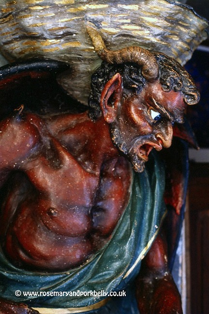 The figure of a Devil supporting the Holy Water Stoup - Rennes le Château Aude France