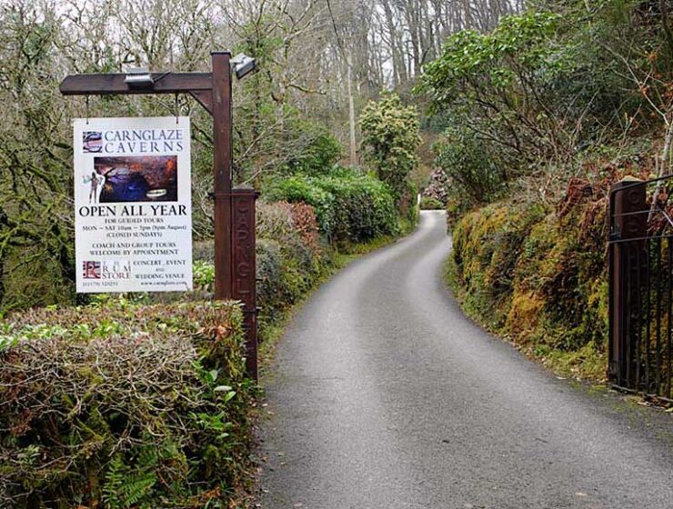 Sign and road entrance to Carnglaze Caverns in Cornwall England