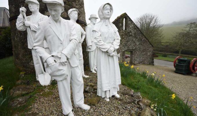 White clay figures outside Wheal Martyn the Victorian china clay works, Cornwall