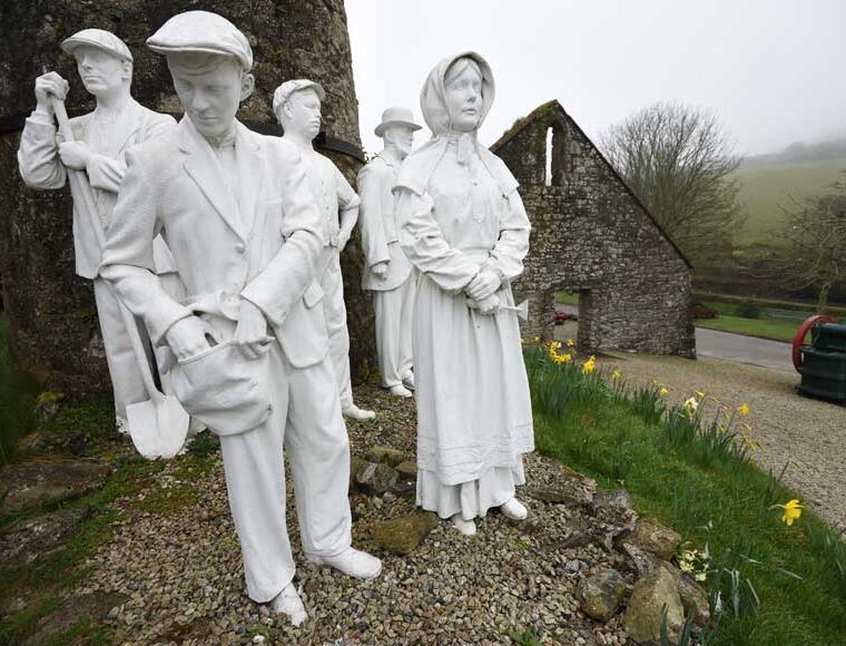 White clay figures outside Wheal Martyn the Victorian china clay works, Cornwall