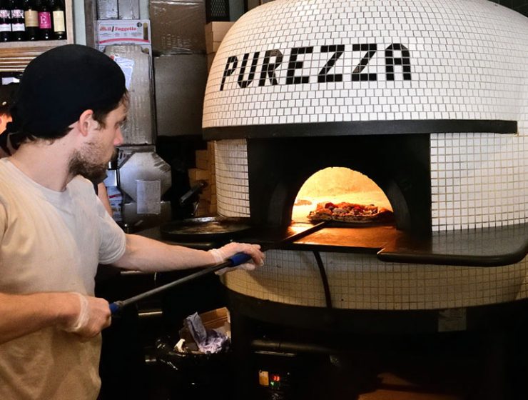 Chef cooking a Purezza pizza