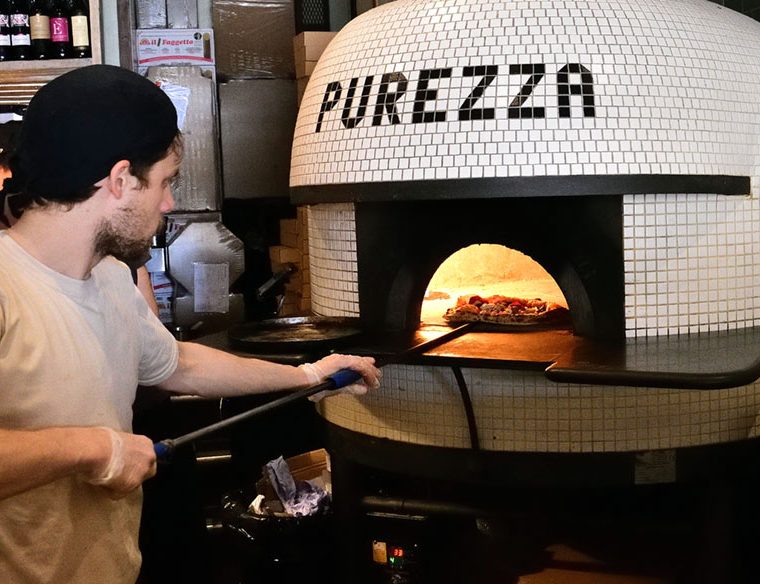 Chef cooking a Purezza pizza