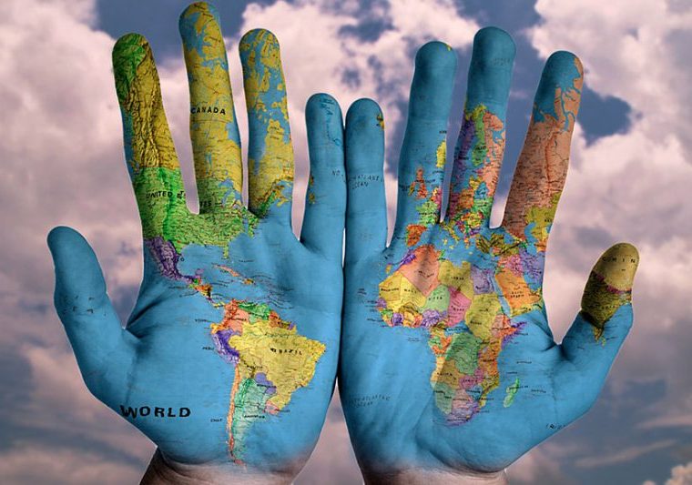 World painted on hands