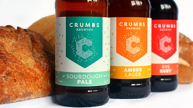3 bottles of Crumbs Brewing beer, sourdough pale ale, amber lager and rye ruby 