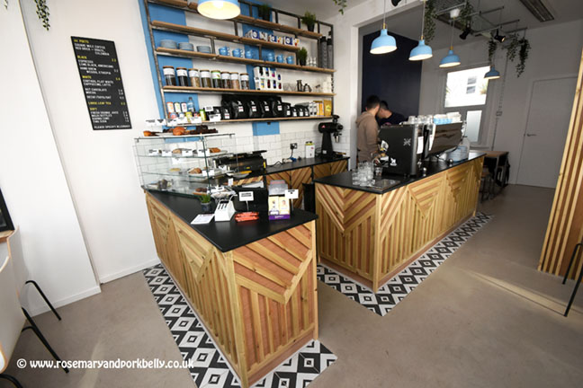 The plain wood and stainless steel interior of 44 Poets Hove