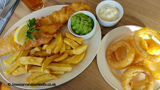Haddock and chips with mushy peas and onion rings - Palm Court restaurant Brighton Palace Pier