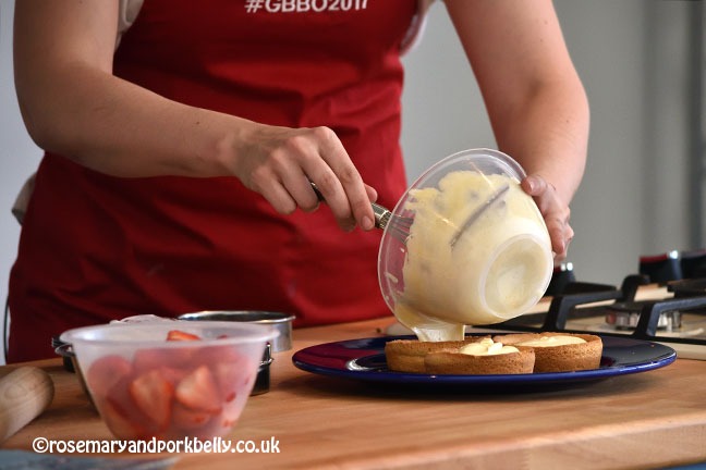 Sophie Faldo preparing strawberry tarts at Foodies Festival Brighton