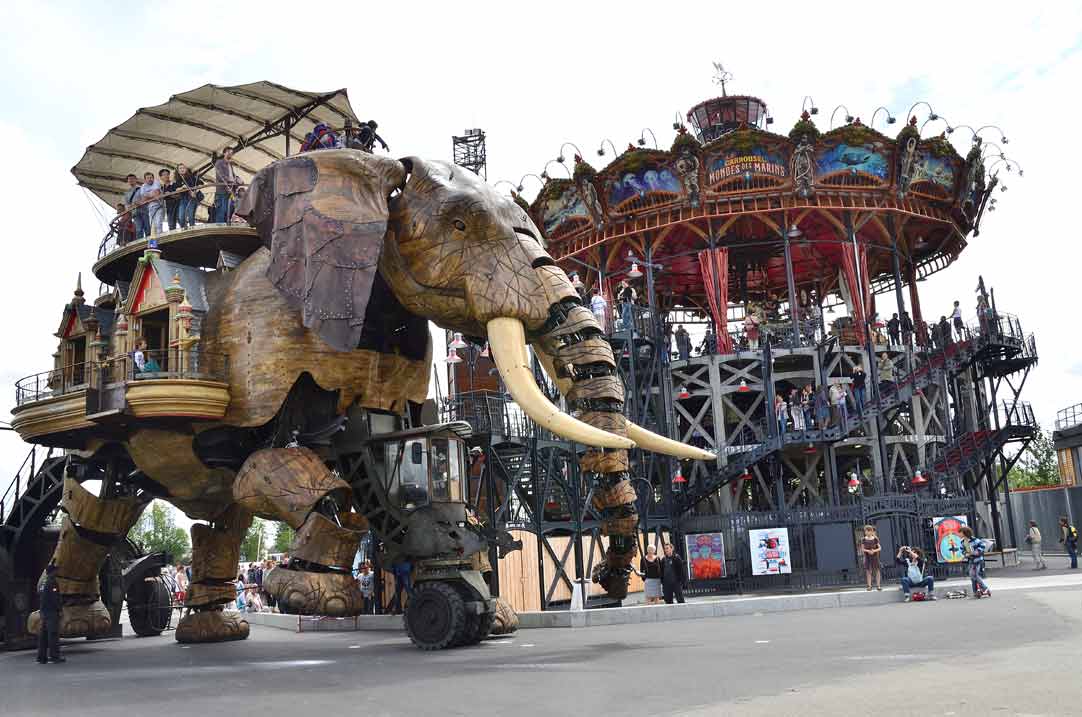 Le Grand Éléphant and fairground carousel at Les Machines de L'ile Nantes, France