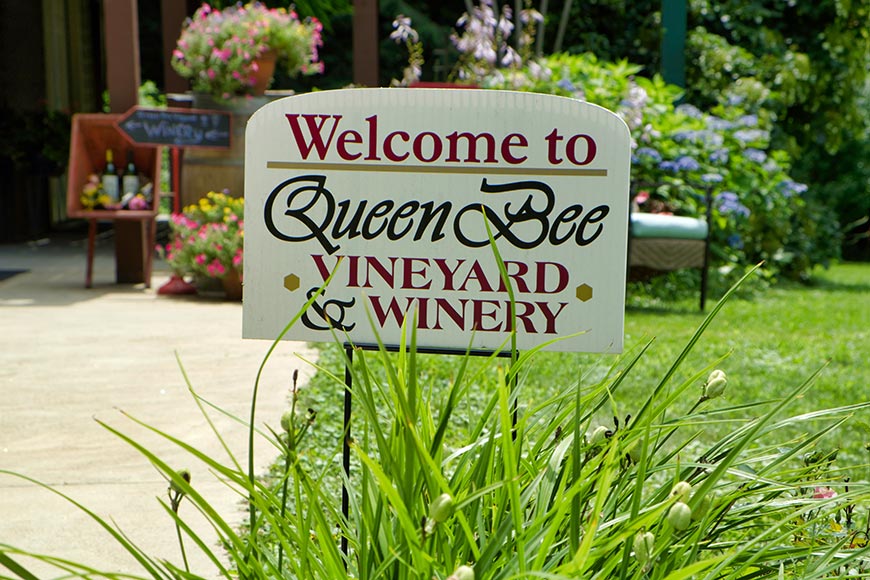 Welcome to Queen Bee Vineyard and Winery sign