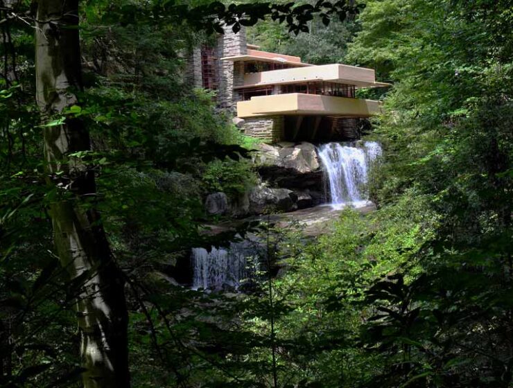 Looking through the trees at Fallingwater on the Bear Run River in Pennsylvania. A house designed by Frank Lloyd Wright