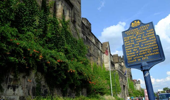 Exterior of Eastern State Penitentiary, Philadelphia, Pennsylvania and information sign