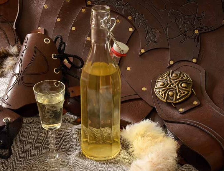 Bottle and glass of English Mead with leather armour