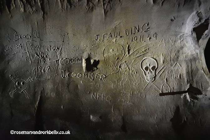 Graffiti and carvings, Tunnel Road West Reigate caves © rosemaryandporkbelly.co.uk