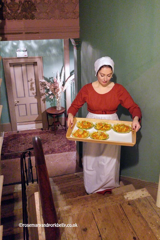Maid in Regency costume carrying tray of food, Regency Town House Hove Sussex © rosemaryandporkbelly.co.uk