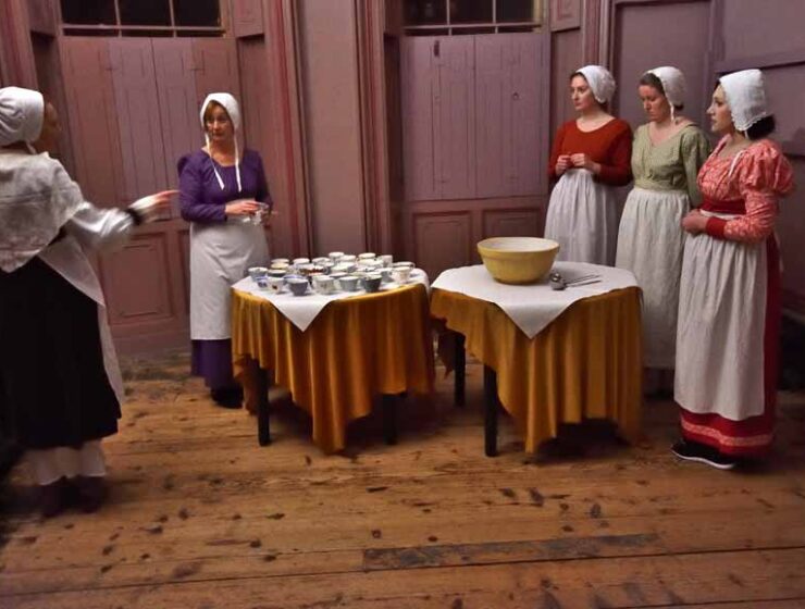 Servants being given instructions at 'Dine Like a Servant' taking place at The Regency Town House in Hove UK