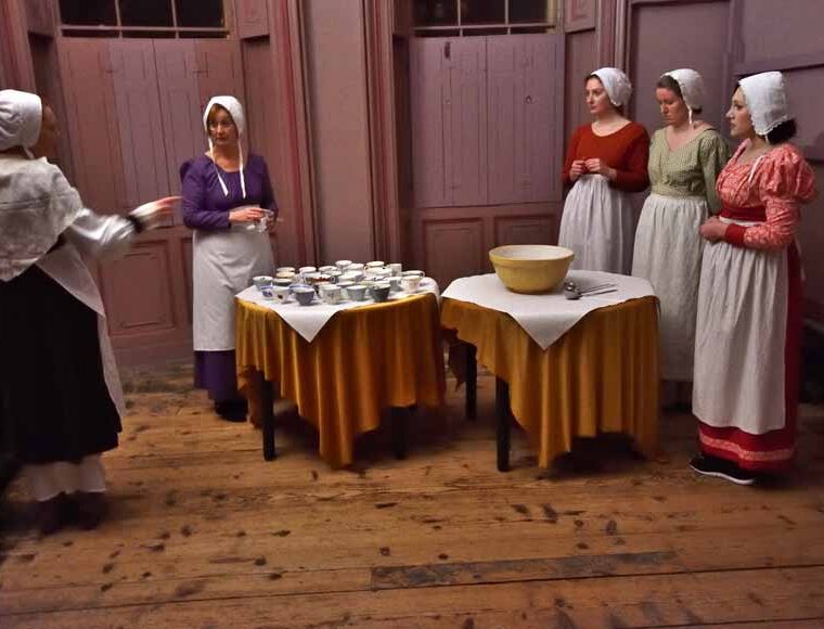 Servants being given instructions at 'Dine Like a Servant' taking place at The Regency Town House in Hove UK