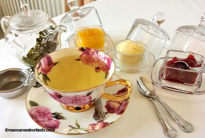 Clotted cream, berry preserve, lemon curd and green tea © rosemaryandporkbelly.co.uk