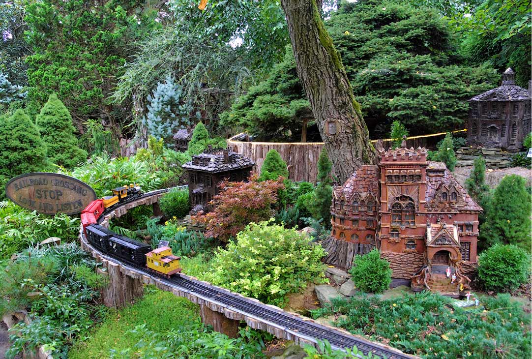 Model train and buildings at the Morris Arboretum Garden Railway, Philadelphia, USA