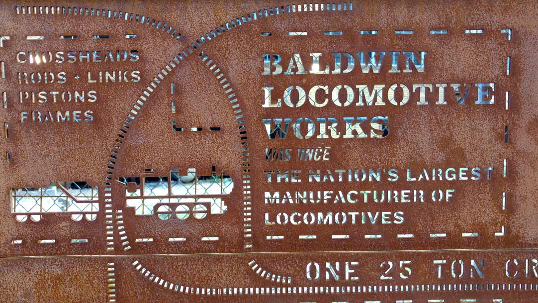 One of the Plaques at The Rail Park Steel Wall an 80-foot long laser cut steel wall, designed by Kate Otte and created at Cloud Geshan in Philadelphia USA