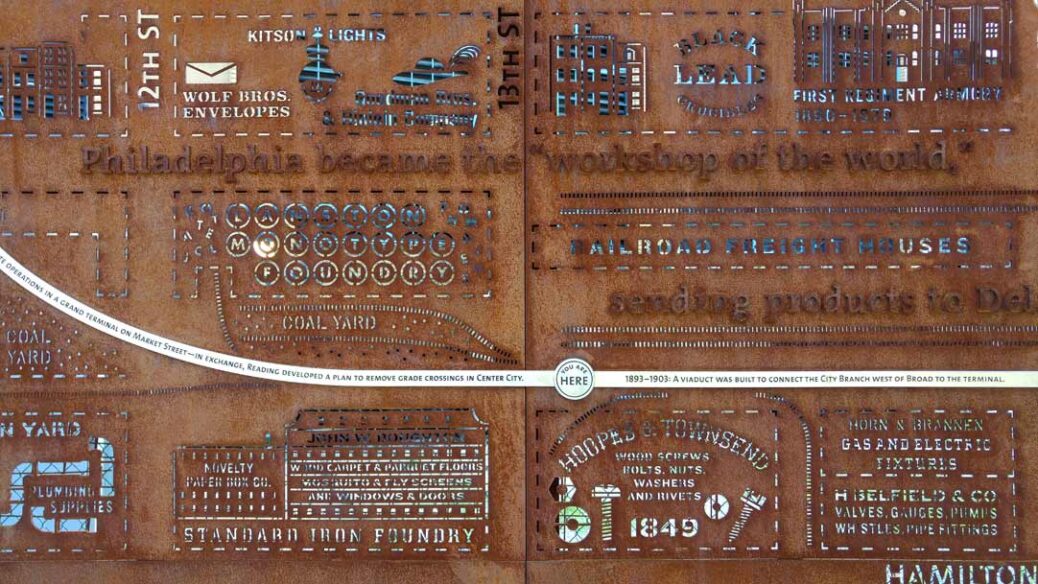 One of the Plaques at The Rail Park Steel Wall an 80-foot long laser cut steel wall, designed by Kate Otte and created at Cloud Geshan in Philadelphia USA