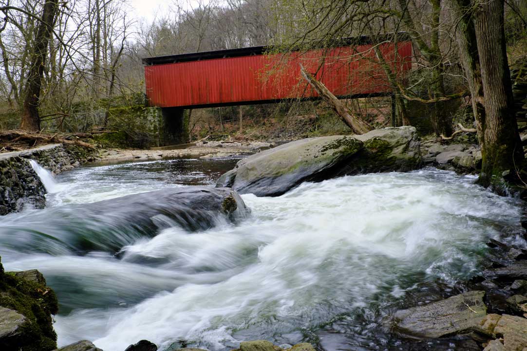 Thomas Mill Covered Bridge Wissahickon Creek in Wissahickon Valley Park in Northwest Philadelphia, Pennsylvania