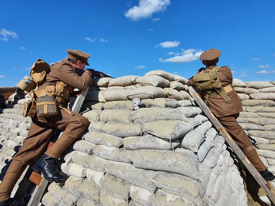 Soldiers taking aim from WW1 memorial trench at Shoreham Fort West Sussex