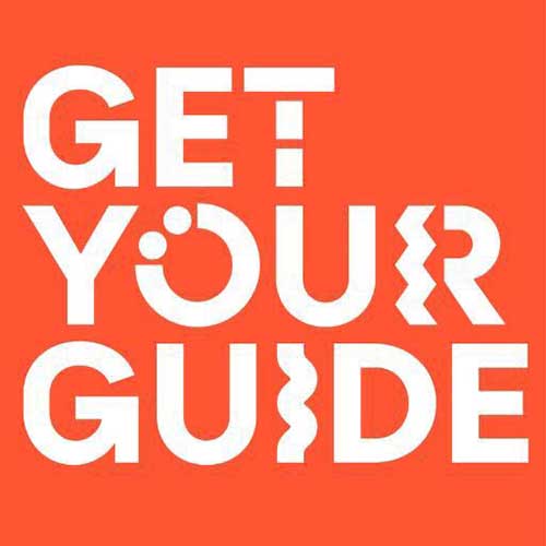 Get Your Guide logo. White text on a vibrant, warm shade of reddish-orange