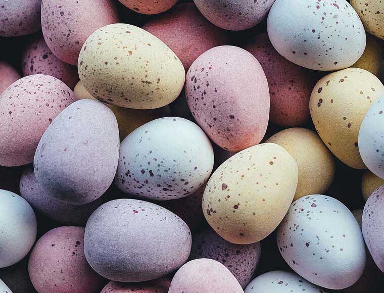 Small chocolate candy pastel coloured eggs