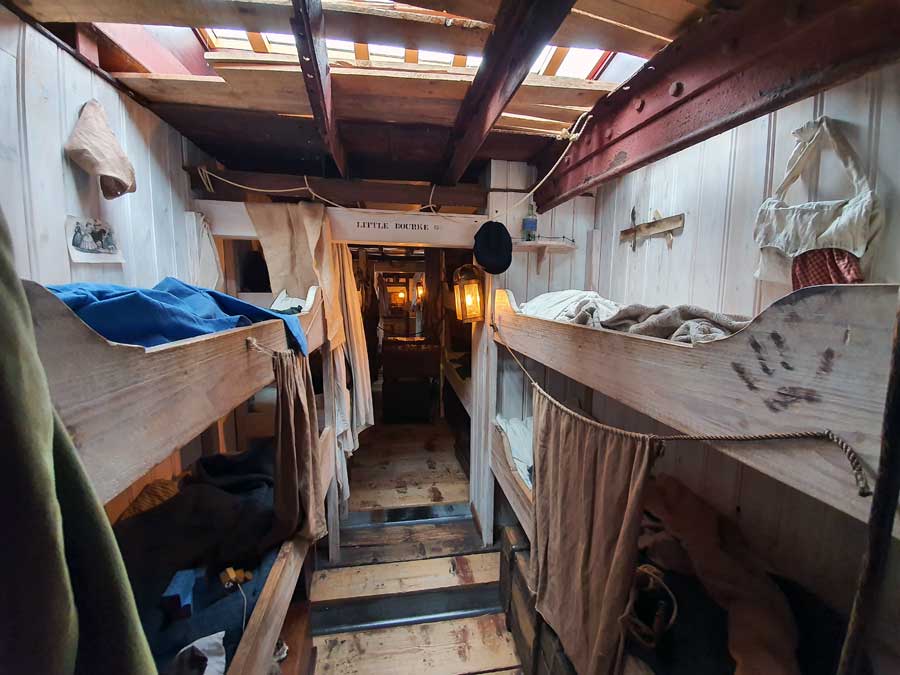Wooden bunkbeds in the sleeping area on SS Great Britain