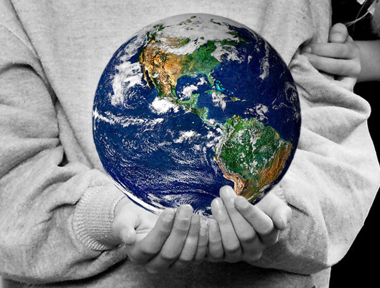 Child holding the world