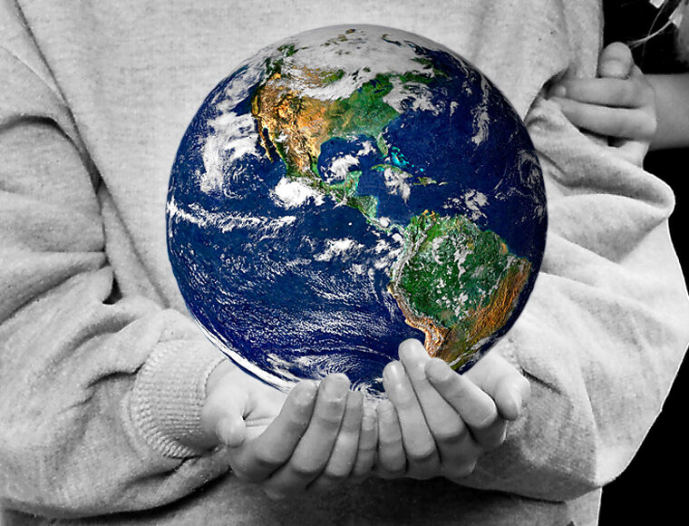 Child holding the world