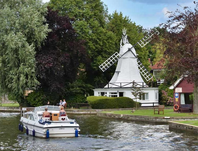 Horning windmill a Grade II listed converted windmill on the banks of the River Bure Norfolk UK