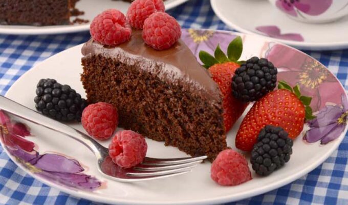 A slice of vegan jumbleberry chocolate cake