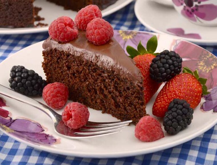 A slice of vegan jumbleberry chocolate cake