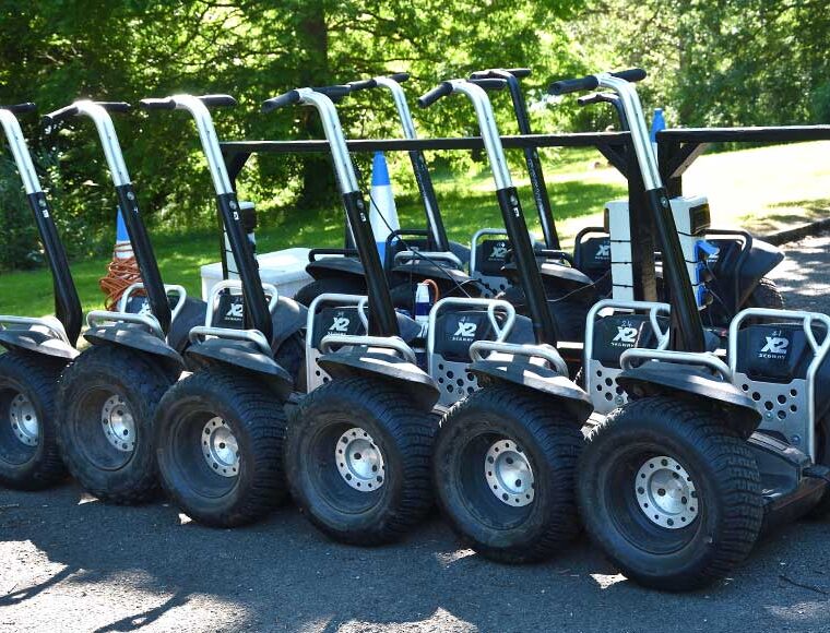 9 parked Segways