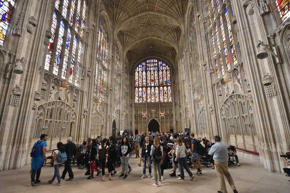 Tour group inside King's College Chapel Cambridge UK