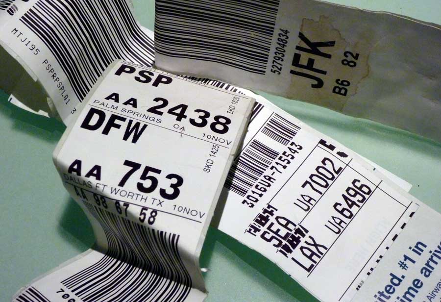 Aircraft luggage tags ©Laurel Fan Flickr (cc by-sa 2.0)