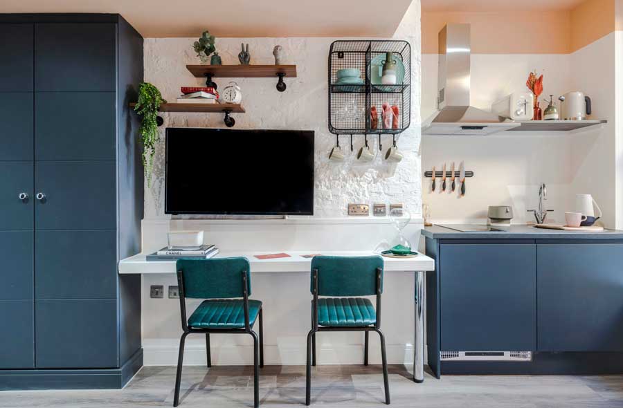 Dining and kitchen area of Your Apartment Pinky King apartment Brixton London UK