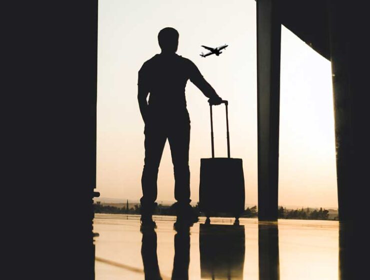 Silhouette of man at airport