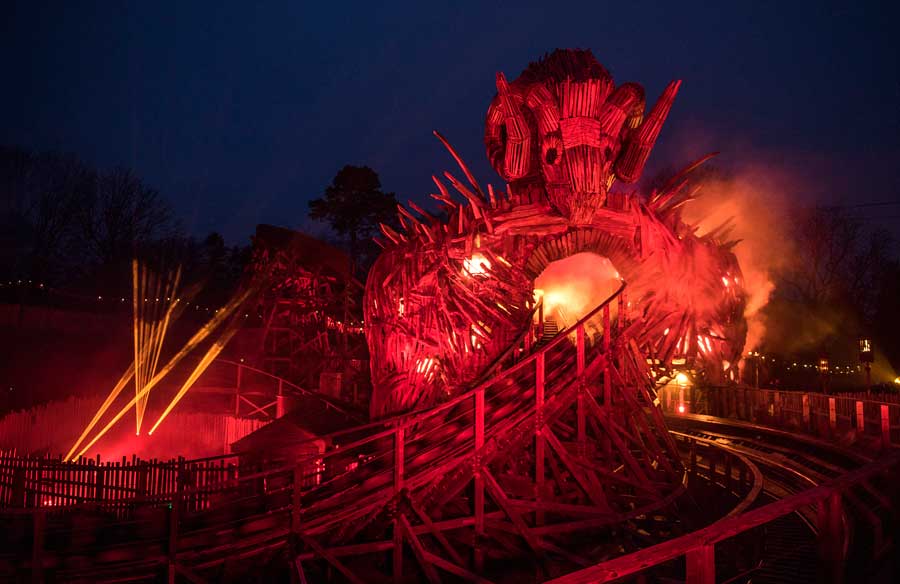 The Wicker Man Coaster lit up after dark at Alton Towers Staffordshire