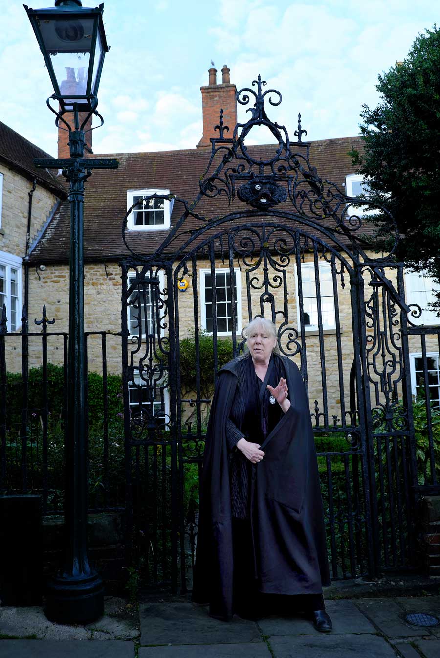 Storyteller dressed in black cape on the Lincoln Ghost Walk Lincoln UK